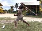 A student practicing a javelin throw