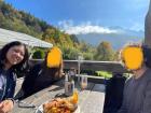 My friends (faces blurred for privacy) and me sitting outside the restaurant enjoying Kaiserschmarrn
