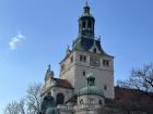 The front entrance of the Bavarian National Museum silhouetted against the sky