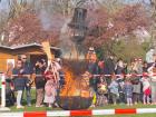 At the spring festival, they burn a wooden snowman in the park