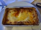 This is a photo of Moussaka, a lasagna like dish make with layers of potatoes, eggs, meat and cheese!