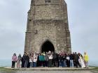This picture features the Glastonbury tower with a hiking group I joined!