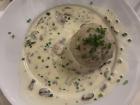 My lunch! Knödel with mushrooms in a creamy sauce.