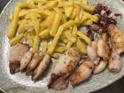 Spanish grilled squid plate with fries