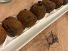 A Spanish tapa (little bite) of cuttlefish croquettes