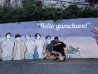Me taking a picture in front of a mural at the Gamcheon Culture Village!