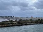 These are the Marsala salt flats; there are pools filled with water and salt, and then windmills nearby