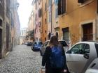 This photo of my girlfriend in Rome, just a five-minute walk from the Colosseum, with the Augustine Forum at the end of the street