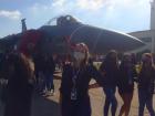 Standing in front of a jet on the military base in Japan