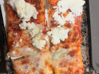 A possible off campus lunch: three-cheese pizza with goat cheese, feta, and cream cheese