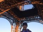 7th Grade me standing under the Eiffel tower for the 1st time