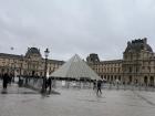 The famous glass pyramid at the entrance to the Louvre Museum 