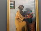 A painting of a woman with flowers, on display at the Petit Palais