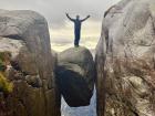 A photo of me on top of Kjeragbolten; a big rock suspended between two cliff faces!