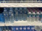 Taken at the store, this photo shows different water bottle brands and their prices in MNT.