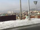 What the ger districts in Ulaanbaatar look like during winter. You can see the very thick smog above the gers and makeshift houses.
