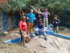 Other Peace Corps Volunteers cleaning up a captacion