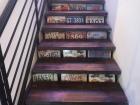 This is a staircase at a local restaurant designed with a variety of global license plates, a lot of them are from U.S. states