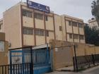 This is what the public boys high school looks like in my neighborhood. The sign above the school contains pictures honoring the Jordanian King and Crown Prince
