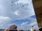On a ferry watching the entire naval fleet come in to the Sydney Harbour for the 125th Anniversary of the Royal Australian Navy