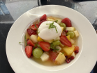 A fresh fruit salad with lemon sorbet; super summery dessert!