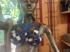 I laughed at the detailed expression on this statue of a woman, which is made out of blue pieces of glass