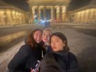 Friends in front of the iconic Brandenburg Gate