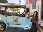 This is a special type of car/bicycle which is called tuk tuk in Portugal