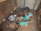 Martha adding maize (corn) flour to boiling water