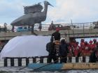 The second queen's canoe has a different bird on top with wings that also flap