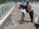 Bikes take goods to Zambia every day. The bridge helps connect the countries and makes it easy to take things across