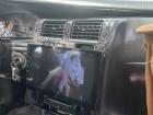 My new taxi was fancy with a custom installed TV in the dashboard, playing music videos