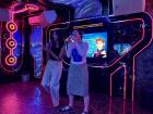 Karaoke is very popular in Việt Nam—two volunteers sing a song from Frozen