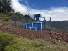Recently constructed fence around water reservoir in Inchapampa