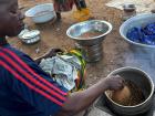 Meriam's mom preparing groundnuts (peanuts). This is also one of Meriam's favorite snacks