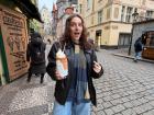 Trying trdelník (chimney cake), a pastry that's hollow and chimney shaped. Originally from Hungary, it's now a popular tourist food in the Czech Republic