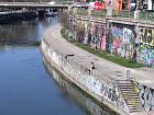 Locals enjoying the sunny weather by the canal