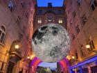 lluminated moon installation that lights up when its dark