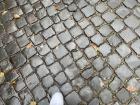 These are cobblestones. Many streets in Rome are made of them — that’s why the singer says the streets are filled with “rubble."