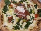 I had this pizza in Naples. With a soft crust and pesto sauce, it was so delicious! Some of the toppings you see are prosciutto, ricotta cheese and dried tomatoes