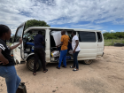 Some locals were using the combi to transport a new refrigerator 