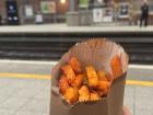 Eating my spice bag while waiting for the train