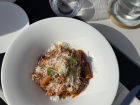 Delicious pasta and potatoes at a rooftop restaurant in Malta, an island nation in Europe
