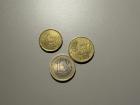 Euro coins: 20 cent, 50 cent, and 1 euro