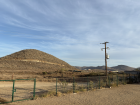 Dry desert hills can be seen from my school