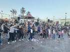 Children dancing to Baby Shark at the Children's Day event downtown