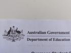 The Commonwealth Coat of Arms used by the Australian Government pictured on an official document.