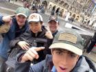 Flexing new hats my friends bought during a surprise layover in Munich, Germany, before heading home to Switzerland.