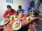 Eating cuy with my host family on Christmas Eve