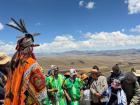 Community members making offerings to Pachamama (Mother Earth) during the Chaccu ceremony